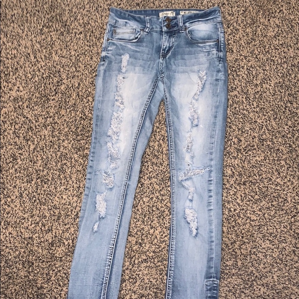 light wash denim skinny ripped jeans